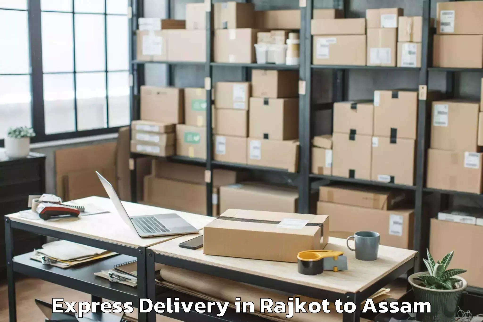 Book Rajkot to Baganpara Pt Express Delivery Online